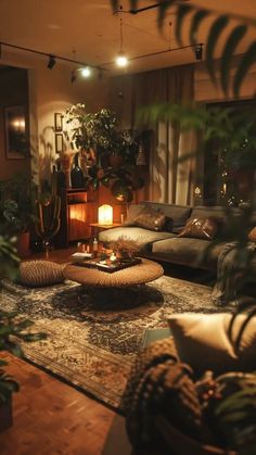 a living room filled with lots of furniture and plants