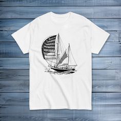 Sail into style with our Monochrome Sailboat Spinnaker Tee, featuring an elegant graphic of a sailboat gracefully sailing under a spinnaker. This shirt effortlessly captures the elegance of sailing, making it a must-have addition to your wardrobe. Embrace the nautical vibes with this unique and effortlessly cool masterpiece. * 100% ring-spun cotton * Sport Grey is 90% ring-spun cotton, 10% polyester * Dark Heather is 65% polyester, 35% cotton * 4.5 oz/yd² (153 g/m²) * Shoulder-to-shoulder taping * Quarter-turned to avoid crease down the center * Blank product sourced from Bangladesh, Nicaragua, Honduras, Dominican Republic, Haiti or Guatemala This product is made especially for you as soon as you place an order, which is why it takes us a bit longer to deliver it to you. Making products on Boat Print, Haiti, Nautical, Sailing, Gender Neutral, Bathing Beauties, Turn Ons, Wardrobe, Tops & Tees