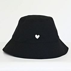 Kerri Rosenthal Women's Bucket Hat Heart In Black Cotton O/S Msrp $128.00 Block The Sun In Style With This Adorable Hat That Will Complement Any Outfit. Expertly Crafted To Elevate Your Style While Providing A Delightful Touch Of Personality. Featuring A Sleek Black Backdrop With A White Embroidered Imperfect Heart Graphic At The Front, A Smaller Brim, A Shorter Crown, And A Signature Yellow Tag Accent. Shell - 100% Cotton. Spot Clean. Measurements - 2.4" Brim, 22.5" Inner Circumference. Authent Cute Hats Black, Black Hat With Pins, Kerri Rosenthal, Pink Baseball Cap, Leopard Scarf, Black Backdrop, Turquoise Cross, Elegant Hats, Warm Winter Hats