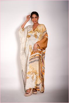 This super gorgeous kaftan. This dress is the perfect definition of a luxury kaftan. Has a belt inside that can be tight around the waist to give a nice snatch. Fun and easy to wear. Elegant Abaya For Vacation, Elegant Maxi Length Eid Kaftan, Elegant Summer Maxi Thobe, Elegant Summer Maxi-length Thobe, Elegant Maxi Length Summer Thobe, Elegant Long Abaya For Vacation, Elegant Belted Abaya, Elegant Maxi Length Abaya For Vacation, Elegant Beach Maxi Dress For Eid