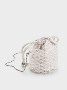 White Beaded Chain-Handle Bucket Bag - CHARLES & KEITH US Beige Rectangular Bucket Bag For Party, Cream Evening Box Shoulder Bag, Chic White Box Bag For Gifts, White Shoulder Bag With Detachable Handle As Gift, Cream Evening Bucket Bag In Pouch Shape, Elegant Cream Pouch Bucket Bag, Cream Evening Bucket Bag Pouch, White Clutch Bag For Formal Occasions, Cream Square Shoulder Bag For Evening