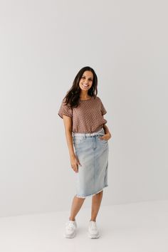 Light wash denim is a must have for any spring/summer wardrobe! Made from a soft and stretchy denim, this raw hem denim skirt is on trend! The knee length 'Lily' brings all the style and still keeps it classy with a flattering, modest fit! 97% Cotton/3% Spandex Wash Cold Gentle Cycle Hang to Dry Light Distressing Soft, Stretchy Denim Model Height 5'5" | Wearing Size 4 Wearing 'Maria' Floral Cotton Top & 'Lily' Light Denim Knee Length Skirt Please carefully measure a similar item before placing y Spring Medium Wash Knee-length Skirt, Casual Knee-length Denim Skirt, Casual Medium Wash Knee-length Denim Skirt, Casual Knee-length Medium Wash Denim Skirt, Casual Medium Wash Denim Skirt For Spring, Spring Straight Leg Skirt With Frayed Hem, Spring Straight-leg Skirt With Frayed Hem, Spring Pencil Skirt With Frayed Hem, Spring Medium Wash Denim Skirt