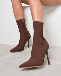 Combining a classic fit with light textures, our Huntley heeled boots are the perfect evening boot option. Designed with a pointed toe, slim, mid-calf height fit, and a stiletto heel, we're obsessed. Style yours with a blazer dress for that effortless day-to-night combination. - Heel measures approximately 4.5 inches/ 11.5cm - Faux leather upper - Model wears UK 6 / EU 39 / US 8 - Fits true to size Fitted High Heel Boots For Work, Fitted High Ankle Mid-calf Boots For Work, Fitted High Ankle Boots For Work, Fitted Mid-calf Heeled Boots For Party, Chic Mid-calf Fitted Heeled Boots, Fitted Mid-calf Boots With Pointed Toe For Work, Fitted High Heel Boots With Sculpted Heel, Fitted Mid-calf Boots With Reinforced Heel, Ankle-high Fitted Heeled Boots For Work