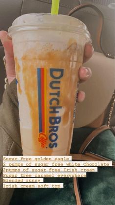 a person holding a drink in their hand with the words dulcedges on it