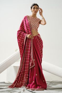 Cherry pink saree with sequin, cutdana, bead embroidery in linear pattern. Paired with checkered pattern blouse.
Components: 2
Pattern: Embroidery
Type Of Work: Sequin, cutdana, bead, linear
Neckline: Boat neck
Sleeve Type: Sleeveless
Fabric: Satin Silk
Color: Pink
Other Details: 
Back deep square neck
Occasion: Wedding - Aza Fashions Modest Dressing, Reception Outfit, Linear Pattern, Power Dressing, Pattern Blouse, Pattern Embroidery, Blouse For Women, Indian Fashion Dresses, Silk Embroidery