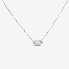 Add some pizzazz to your style with this 14K necklace, featuring a marquise diamond solitaire set in a unique east-west bezel. It is available in yellow and white gold. Curate an eye-catching statement look by matching this with the other natural beauties from our Diamond Jewelry Collection. Natural Diamond: 0.17cts 18K Yellow or White Gold Length: 18 Inches Marquise Diamond Necklace, Solitaire Setting, Marquise Diamond, East West, Diamond Solitaire, Diamond Jewelry, Natural Diamonds, Your Style, Diamond Necklace