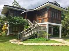 a house with stairs leading up to it