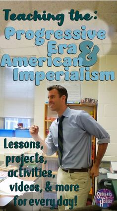 a man standing in front of a desk with an advertisement on the wall behind him