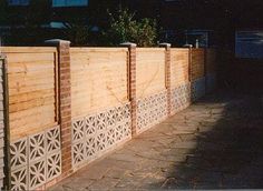 a row of wooden fences sitting next to each other