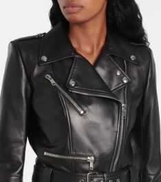 Find ALEXANDER MCQUEEN Cropped Leather Biker Jacket on Editorialist. Material: 100% lamb leather. Care instructions: do not wash. Made in Italy. Designer color name: Black. Lining: 100% viscose. Contains non-textile parts of animal origin. Closure: two-way zipped front. Attached belt. Comes with garment bag. Chic Black Biker Jacket With Belt Loops, Moto Style Belted Workwear Outerwear, Moto Style Belted Outerwear For Work, Luxury Belted Biker Jacket For Fall, Luxury Biker Jacket With Asymmetrical Zip For Fall, Luxury Asymmetrical Zip Biker Jacket For Fall, Designer Fitted Outerwear With Belt Loops, Designer Fitted Leather Jacket With Belt Loops, Designer Belted Leather Jacket For Fall