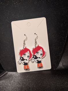 These cute little Ruby Gloom earrings are sure to delight any fan. Light weight. Cute Halloween Earrings For Pierced Ears, Themed Red Earrings, Cute Hypoallergenic Halloween Earrings, Quirky Hypoallergenic Dangle Earrings, Themed Dangle Pierced Earrings, Quirky Drop Earrings With Ear Wire, Themed Pierced Earrings As A Gift, Themed Earrings For Pierced Ears As Gift, Themed Gift Earrings