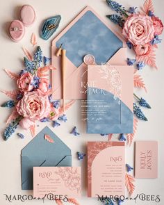 the wedding stationery was done in pink, blue and peach with flowers on it