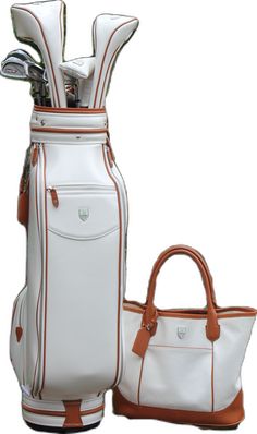 two golf clubs and a white bag on a white background