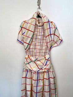 Geoffrey Beene Part Two Rainbow Plaid Pop Art Silk Polkadot Dress XS SMeasurements taken flat unstretched and approximate; 19” underarm 13” waist 53” length3 buttons at the topSide zipper Has matching belt/ shawl depending how you wear Multicolor Ruched Silk Dress, Spring Retro Dress With Ruched Details, Retro Spring Dresses With Ruched Details, Retro Ruched Dress For Spring, Spring Retro Ruched Dresses, Retro Multicolor Dresses For Daywear, Designer Multicolor Spring Dress, Lined Multicolor Daywear Dresses, Multicolor Lined Dress For Daywear