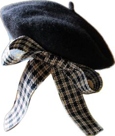 a black hat with a bow tied to it