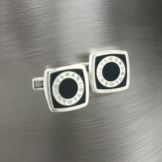 Bulgari Bvlgari Estate Onyx Cufflinks Silver B7TRUSTED SELLER SINCE 2002PLEASE SEE OUR HUNDREDS OF POSITIVE FEEDBACKS FROM OUR CLIENTS!!FREE SHIPPINGDETAILSMaterial: Onyx and Sterling SilverWeight: 18 Grams Introducing the quintessence of luxury and design - the authentic Bulgari Bvlgari sterling silver cufflinks. These exquisite cufflinks are a testament to Bulgari’s renowned craftsmanship and timeless elegance. Crafted from premium sterling silver, they feature the iconic Bulgari Bvlgari logo, Bvlgari Logo, Onyx Cufflinks, Silver Cufflinks, Cufflinks Men, Silver Pieces, Timeless Elegance, Onyx, Cufflinks, Fine Jewelry