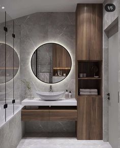 a bathroom with a sink, mirror and bathtub in the middle of it's walls