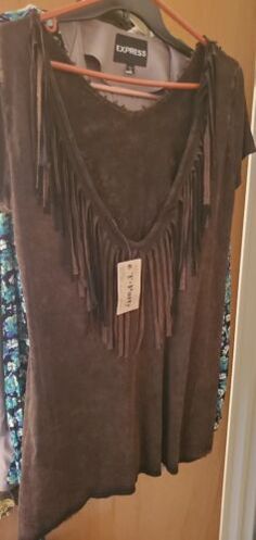 Find ideas๏ฟฝand inspiration for Free People Tea Party Top Size LARGE BOHO FRINGED TOP BROWN NWT, Fashion Women's Tops Brown Fringe Tops For Fall, Brown Fringe Top For Fall, Brown Fringe Tops For Festival, Brown Fringe Top For Festival, Flowy Bohemian Brown Top, Brown Fringed Tops For Festival, Bohemian Peasant Top With Tassel Ties V-neck, V-neck Fringe Top For Fall, Bohemian Beige V-neck Peasant Top