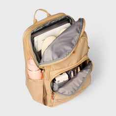 Keep your belongings organized in style with this 17-Inch Top-Load Backpack from Embark™️. This softside backpack features a main zipper compartment with plenty of space for stashing your belongings and a laptop pocket for carrying a laptop up to 15 inches. Multiple zip pockets on the front offer you extra space to stash small items, while a side water bottle pocket adds even more convenience. Plus, adjustable padded shoulder straps and a top handle allow for convenient carrying whether you're h Everyday Large Capacity Standard Backpack Luggage, Daily Use Travel Backpack With Anti-theft Pocket, Functional Pockets Softback Backpack, Multifunctional Everyday Softback Backpack, Everyday Multifunctional Softback Backpack, Functional Travel Backpack With Softback, Functional Laptop Bag For Travel And Back To School, Functional Laptop Bag For Travel And School, Functional Softback Backpack For Travel