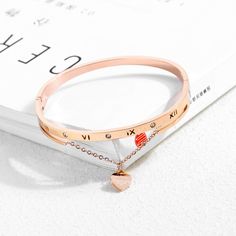 Product name: Rose Gold Women's Roman Numeral Bracelet Material: Titanium steel，Zircon Size: perimeter 165mm Packaging: gift box Color: rose gold Product weight: 14g Remarks Statement: We use vacuum furnace electroplating for color plating, and the material is also selected 316 titanium steel, no discoloration, no rust, no allergy, no black, wear-resistant, green and environmental protection Luxury Rose Gold Adjustable Chain Bracelet, Luxury Rose Gold Bracelets With Adjustable Chain, Luxury Rose Gold Bracelet With Adjustable Chain, Luxury Minimalist Rose Gold Chain Bracelet, Luxury Rose Gold Cuff Bracelet Gift, Designer Luxury Rose Gold Bracelets, Cheap Rose Gold Chain Bracelet For Gift, Cheap Rose Gold Cuff Bracelet As Gift, Cheap Rose Gold Bracelet For Personalized Gift