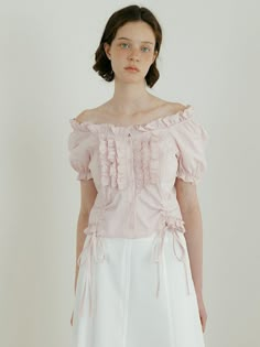 This is a minimal and feminine top by Lucirzu that is made out of high quality and sturdy material. With distinctive mood of the design and comfortable wear, you can use it for your daily lifestyle.- Delicate frill detail- 2 way styling as an off shoulder top- Modern and minimal mood Feminine Ruffle Puff Sleeve Tops, Feminine Ruffled Puff Sleeve Tops, Pink Ruffled Tops For Day Out, Feminine Ruffled Tops For Day Out, Pink Ruffled Blouse For Day Out, Chic Ruffles Tops For Daywear, Chic Ruffled Tops For Daywear, Feminine Pink Ruffled Tops, Pink Feminine Top With Ruffles