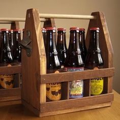 a wooden rack with six bottles of beer in it and the words woodworking projects written below