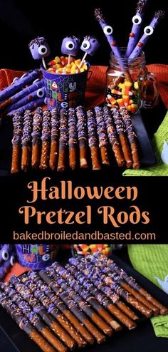 halloween pretzel rods are displayed on a table