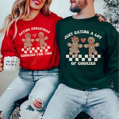 EACH SHIRT IS SOLD SEPARATELYSELECT SAYING/COLOR AND SIZE FOR EACH SHIRT AND ADD TO CART 🍪 Snuggle up in sweetness this festive season with our 'Eating Christmas Cookies for Two' & 'Just Eating a Lot of Cookies' couple sweatshirts! 🎄👶 Get ready to rock those adorable gingerbread vibes while celebrating the joy of impending parenthood. Embrace your growing family with a dash of humor and a whole lot of cookie-induced cheer. These quirky matching sweatshirts are the perfect way to announce your Cute Couple Christmas Pajamas Holiday, Christmas Matching Couple Pajamas, His And Her Christmas Sweaters, Gingerbread Sweatshirt, Gingerbread Sweater, Couple Graphic, Matching Couple Pajamas, Couples Christmas Sweaters, Gingerbread Couple