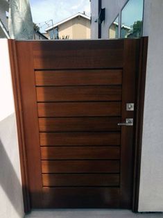 a close up of a wooden door on a building