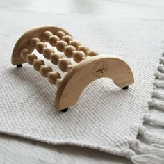 The Maverick Deluxe Foot Massager has independent moving wooden spheres that stimulate all of the pressure points in your feet. Perfect for tired arches and achy feet. Soft grip pads on the base hold the massager in place. Made from Chinese Cherrywood. Meridian Massage, Therapy Tools, Pressure Points, Gadgets, Quick Saves