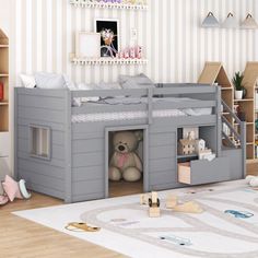 a child's bedroom with a loft bed and toys on the floor in front of it