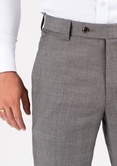 Our Spanish Grey Prince Of Wales pants are expertly tailored with a unique light grey, lightweight fabric that is sure to make a statement. Crafted by experienced artisans, the pants are made to ensure a perfect fit with superior comfort. A timeless color and style, these custom pants are the perfect way to upgrade your wardrobe. Tailored Gray Bottoms For Tailoring, Gray Slim Fit Dress Pants With Tapered Leg, Gray Slim Fit Tapered Leg Dress Pants, Classic Gray High-waisted Dress Pants, Elegant Gray Slim Fit Pants, Gray Fitted Ankle Pants, Fitted Gray Ankle-length Pants, Elegant Gray Bottoms With Pressed Crease, Classic Fitted Gray Pants