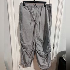 H&M Parachute Pants Size M, Never Worn Because They Were A Little Long On Me (I’m 5’2 For Reference). Super Comfortable! Trendy Gray Parachute Pants For Spring, H&m Casual Tapered Leg Pants, H&m Casual Ankle-length Pants, Relaxed Fit Bottoms With Elastic Waistband By H&m, H&m Relaxed Fit Bottoms With Elastic Waistband, H&m Bottoms With Elastic Waistband And Relaxed Fit, H&m Tapered Leg Bottoms For Spring, H&m Pants For Spring Loungewear, H&m Tapered Leg Spring Bottoms