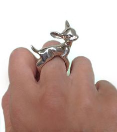 Here's a deer ring whose little legs wrap around your finger never to let go. We have transformed Anomaly's best selling Deer Necklace into a companion ring for your wearing pleasure. Get on it. Dimensions: The deer's body measures just under 1 and 1/4 inches long. She comes in most full and half sizes. Materials: Silver Tone: solid white brass (shown in photos) Gold Tone: solid yellow brass Sterling Silver: solid sterling silver If you would like this ring in a metal that you don't see listed j Fawn Necklace, Deer Ring, Deer Rings, Deer Necklace, Photo Gold, Silver Gold Jewelry, Funky Jewelry, Dream Jewelry, Solid Yellow