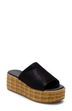 A woven raffia platform enhances the earthy vibes of this breezy and versatile sandal. 1 1/2" heel; 1" platform Synthetic upper/leather lining/synthetic sole Imported Comfortable Straw Platform Wedge Sandals, Woven Leather Sandals With Round Toe, Leather Espadrilles With Woven Detail For Vacation, Casual Open Toe Woven Leather Espadrilles, Synthetic Espadrilles With Textured Sole For Vacation, Natural Leather Platform Espadrilles, Straw Sandals With Textured Sole And Round Toe, Natural Wedge Heel Sandals With Textured Sole, Natural Color Wedge Heel Sandals With Textured Sole