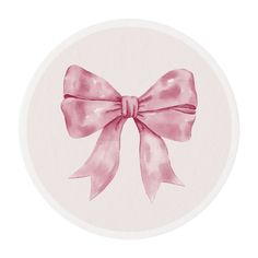 a pink bow on top of a white circle with watercolor effect in the background