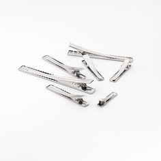 Name: Flat top metal Crocodile hairpin Material: Iron + Alloy Size:see the picture Quantity:5/10/30/50/100/200pcs Description: Silver metal crocodile hair clip made of metal lead and nickel. Classic and durable, we have bobby pins to choose from in 17 different sizes.                 Bulk sale, if you have different ideas, please contact us.   Use: The clip is suitable for DIY making, you can add your favorite accessories to the alligator hair clips to create your own hair clips as you like.   Disclaimer: 1. Due to factors such as shooting lighting, background, display, etc., the picture will be different from the real object. 2. The product will be scratched due to friction during transportation, which is not a quality problem of the product, please understand. Pet Bows, Silver Flats, Diy Making, Clip Hair, Flats Top, Barrettes, Hair Accessory, Animals For Kids, Hair Clip