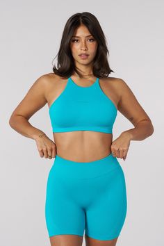 MATERIAL: 54% polyamide, 36% polyester, 10% elastane. FIT: True to Size DESIGN: Introducing Hourglass Bra Tank with Cross Back and Built-In Padding. The built-in padding provides extra comfort and shape, making it perfect for low to medium-impact activities. Crafted from soft, breathable fabric, this tank offers a seamless, chafe-free fit that keeps you comfortable and confident all day long. Ideal for workouts or casual wear, this tank is a stylish and practical addition to your activewear coll Bra Tank, First Photo, Breathable Fabric, Casual Wear, Built In, Active Wear, Turquoise, Bra, Fabric