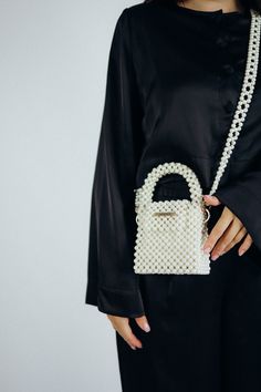 Elegant White Bags With Pearl Chain, Elegant Square Handmade Shoulder Bag, Elegant Tote Shoulder Bag With Pearl Handle, Cream Evening Bag With Pearl Handle As Gift, Cream Evening Bag With Pearl Handle For Gift, Elegant Bags With Pearl Chain, Elegant Beaded Top Handle Bag, Elegant Small Evening Shoulder Bag, Square Evening Bag With Pearl Handle As Gift