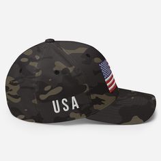 a camo hat with an american flag on the front and usa embroidered on the side