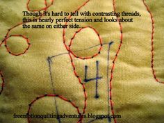 a close up of a piece of fabric with words written on it and an image of a teddy bear