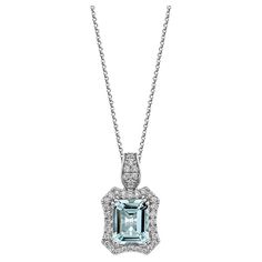 This collection features an array of Aquamarines with an icy blue hue that is as cool as it gets! Accented with Diamonds this pendant is made in white gold and present a classic yet elegant look. Aquamarine Pendant in 18Karat White Gold with White Diamond. Aquamarine: 2.773 Carat, 10X8mm size, Octagon shape. White Diamond: 0.291 Carat, 1.30mm size, round shape, G color, VS clarity. White Diamond: 0.034 Carat, 1.60mm size, round shape, G color, VS clarity. Gold: 3.70g, 18Karat White Gold. P362 Octagon Shape, Aquamarine Pendant, Naha, Icy Blue, Aqua Marine, Blue Hues, White Diamond, Aquamarine, Jewelry Necklace Pendant