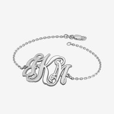 Show off your own initials or those of someone you love with this personalized monogram bracelet.Monogram size: 25x32mmPersonalization: Up to 3 initials. Initials will appear exactly as entered; center initial will be enlarged.Care: Wipe CleanJewelry photos are enlarged to show detail.Features: Personalized, MonogrammableJewelry Closure: Lobster ClaspMetal Color: WhiteChain Length: 7 1/2 InchChain Width: 1.95 MillimetersChain Construction: CableBracelet Type: Chain BraceletsMetal: Sterling Silve Classic Personalized Initials Bracelet, Personalized Silver Bracelet With Initials, Personalized Silver Bracelets With Initials, Classic Monogram Name Bracelet As Gift, Monogram Bracelet Jewelry For Personalized Gift, Personalized Monogram Bracelet Jewelry Gift, Adjustable Monogram Bracelet As Personalized Gift, Monogrammed Bracelet Jewelry For Personalized Gift, Adjustable Monogram Bracelet For Personalized Gift