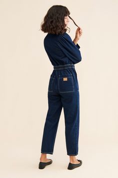 Rent Lorna Denim Jumpsuit from Nuuly. Pick 6 items for $98/month. Free shipping + returns. Workwear Overalls In Medium Wash Jeans, Medium Wash Overall Jeans For Work, High Waist Medium Wash Overalls For Workwear, Dark Wash Cotton Jumpsuit For Work, Spring Dark Wash Overalls For Work, Chic Dark Wash Jumpsuits And Rompers With Pockets, Dark Cotton Jumpsuit For Work, Spring Workwear Dark Wash Overalls, Cotton High-rise Jumpsuits And Rompers For Work