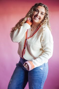 This cardigan is so beautiful! It is such good quality and so elevated with it's details. It features color block stripes on the cuffs and down the front with four working buttons down the front. It's so soft and would be perfect with your favorite pair of jeans, over a dress and it will transition so well into the warmer months. Model is wearing a size Large Winter Long Sleeve Cardigan With Striped Cuffs, Long Sleeve Cardigan With Striped Cuffs For Winter, Winter Cardigan With Striped Cuffs And Long Sleeves, Casual Winter Cardigan With Striped Cuffs, Long Sleeve Cardigan With Striped Cuffs For Fall, Fall Cardigan With Striped Cuffs And Long Sleeves, Casual Fall Cardigan With Striped Cuffs, Spring Color Block Cotton Cardigan, Spring Cotton Color Block Cardigan