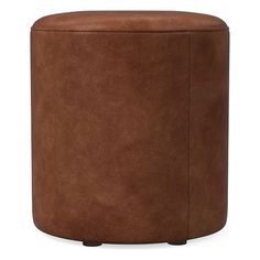 a brown leather stool on a white background