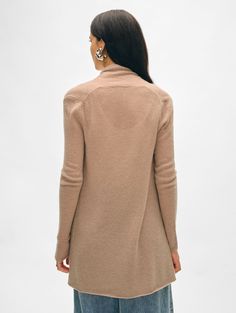 The longest-running piece at White + Warren, the Cashmere Trapeze Cardigan is a chic fingertip-length open sweater that works on every body type. No matter what color you choose, you'll want to wear this timeless style season after season. Details Straight fit. Long sleeve. Length in size small is 32 1/2". The model is 5'10 1/2" and is wearing a size small. 100% Cashmere. Hand wash cold or dry clean. Do not twist or wring. Reshape and lay flat to dry. Warm iron if needed. Style #11092 Cashmere Travel Wrap, Open Sweater, Cardigan Top, Wrap Sweater, Sweater Sale, Knitwear Cardigan, No Matter What, Nordic Style, Shopping Trip