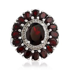 Ross-Simons - 5.20 ct. t. w. Garnet Ring in Sterling Silver. Size 9. Casting a rich, wine-red hue, this ring has a regal look on the hand. Here, a lovely 2.00 carat oval garnet is haloed by 3.20 ct. t. w. oval garnets of a more petite size, set along a beaded frame of brightly polished sterling silver. 3/4" wide. Garnet ring. Garnet birthstones are the perfect gift for January birthdays. Formal Round Garnet Cluster Ring, Silver Garnet Ring, Garnet Drop Earrings, Beaded Frame, Essential Jewelry, Rhodolite Garnet Ring, Jewelry Presentation, Garnet Birthstone, Garnet Bracelet