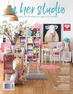 a magazine cover with an image of a cow on the wall and furniture in the background