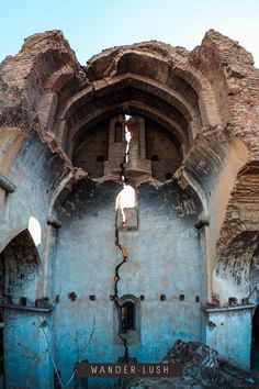 an old building with a bell in the center and windows on each side that says wander lush